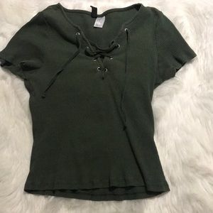 Green right tie up shirt.